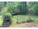A fenced garden plot featuring cultivated soil, ready for planting and gardening at 3133 Callie Still Rd., Lawrenceville, GA 30045