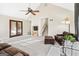Bright living room with views to exterior and stairs, neutral carpet, fireplace at 3133 Callie Still Rd., Lawrenceville, GA 30045