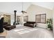 Bright living room featuring many windows, a fireplace, high ceilings, and neutral carpet at 3133 Callie Still Rd., Lawrenceville, GA 30045