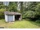 Outbuilding and large green lawn at 3133 Callie Still Rd., Lawrenceville, GA 30045