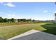 Wide-open backyard space showcasing a well-maintained lawn and privacy fencing in the distance at 838 Maduro Way, Mcdonough, GA 30253