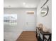 Well-lit entryway with a console table and decorative accents, providing a warm welcome at 838 Maduro Way, Mcdonough, GA 30253