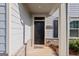 Close-up of a classic front door with decorative details, showcasing the home's welcoming entrance at 838 Maduro Way, Mcdonough, GA 30253