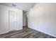 Bedroom with wood-look floors and a closet, offering both style and practicality at 325 Espana St, South Fulton, GA 30349