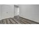 Bedroom with wood-look floors and closet offering ample storage space at 325 Espana St, South Fulton, GA 30349