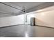 Spacious garage offers room for storage and a car, with ample lighting overhead at 325 Espana St, South Fulton, GA 30349