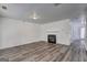 Open living area featuring a fireplace, neutral paint, and modern flooring at 325 Espana St, South Fulton, GA 30349