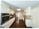 Bright kitchen with stainless steel appliances and white cabinets at 4313 Executive Dr, Stone Mountain, GA 30083