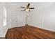 Spacious bedroom featuring hardwood floors, white walls, and natural light at 2584 Oldknow Nw Dr, Atlanta, GA 30318