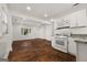 Open kitchen with white appliances and granite countertops at 2584 Oldknow Nw Dr, Atlanta, GA 30318
