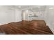 Open living area with hardwood floors connecting to the kitchen at 2584 Oldknow Nw Dr, Atlanta, GA 30318