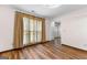 Bedroom with hardwood floors and a window with large beige drapes at 224 Claridge Curv, Peachtree City, GA 30269