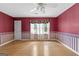 Bedroom featuring hard wood floors, ceiling fan, and large windows at 224 Claridge Curv, Peachtree City, GA 30269