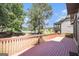 Large wooden deck overlooking a lake and wooded area at 225 S South Shore Ter, Fayetteville, GA 30214