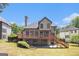 Spacious backyard with a large deck, perfect for outdoor entertaining and relaxation at 225 S South Shore Ter, Fayetteville, GA 30214