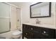 This bathroom features a large vanity and shower and tub combination at 225 S South Shore Ter, Fayetteville, GA 30214