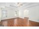 Spacious main bedroom with tray ceilings and a ceiling fan at 225 S South Shore Ter, Fayetteville, GA 30214