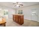 This kitchen features an island, recessed lighting, and an exterior door at 225 S South Shore Ter, Fayetteville, GA 30214