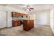 This kitchen features an island, ample cabinet space, and stainless steel appliances at 225 S South Shore Ter, Fayetteville, GA 30214