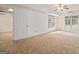 This spacious living room features natural light and neutral tones at 225 S South Shore Ter, Fayetteville, GA 30214