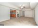 This living room features recessed lighting and access to the kitchen and bathroom at 225 S South Shore Ter, Fayetteville, GA 30214