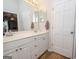 Bathroom featuring a double vanity and white cabinets at 112 Kirton Turn, Peachtree City, GA 30269