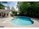 Backyard pool and spa with concrete surround, perfect for relaxation and entertainment at 112 Kirton Turn, Peachtree City, GA 30269