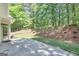 Patio and backyard with professional landscaping, perfect for outdoor entertaining at 1155 Graystone Xing, Alpharetta, GA 30005