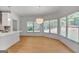 Bright dining area featuring large windows and a modern pendant light at 1155 Graystone Xing, Alpharetta, GA 30005