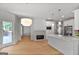 Open-concept kitchen and dining area featuring modern lighting at 1155 Graystone Xing, Alpharetta, GA 30005