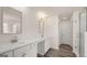 Modern bathroom with dual sinks, quartz countertop, and a walk-in shower at 1804 Quaker St, Hampton, GA 30228