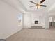 Spacious main bedroom featuring a ceiling fan and tiered ceiling at 1804 Quaker St, Hampton, GA 30228