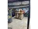 Unfinished basement showcasing water heater and workbench; good storage and utility at 142 Carrollwood Dr, Fayetteville, GA 30215