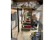 Basement staircase leading to open area; includes storage under staircase and a nearby washer and dryer at 142 Carrollwood Dr, Fayetteville, GA 30215