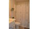 Cozy bathroom with a patterned shower curtain and a modern vanity setup at 142 Carrollwood Dr, Fayetteville, GA 30215