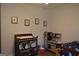 bedroom featuring a changing table and a play kitchen for creative play at 142 Carrollwood Dr, Fayetteville, GA 30215
