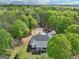 Majestic estate amidst a dense forest, offering a serene and private living experience at 270 Morrow Rd, Newborn, GA 30056
