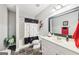 Bright bathroom with neutral walls, patterned floors, modern vanity, and shower with curtain at 270 Morrow Rd, Newborn, GA 30056