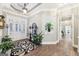Elegant foyer with hardwood floors, a stylish rug, and a decorative table, creating a grand entrance at 270 Morrow Rd, Newborn, GA 30056