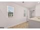 Bathroom featuring double sink vanity and tile floors with lots of natural light at 1483 Autumn Wind Dr # 24, Dacula, GA 30019