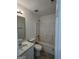 Clean bathroom featuring a shower-tub combo and a vanity with sink at 2700 Marlin Dr, Mcdonough, GA 30253