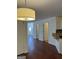 Open living space showing hardwood flooring and transitions into other areas of the home at 2700 Marlin Dr, Mcdonough, GA 30253