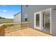 Enjoy the outdoors on this lovely wooden deck with beautiful french doors to the house at 1473 Autumn Wind Dr # 25, Dacula, GA 30019