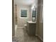 Modern bathroom featuring a vanity, mirror, and tiled floors at 2953 Meadowview Se Dr, Atlanta, GA 30316