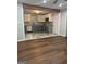 Open-concept view of kitchen with stainless appliances, gorgeous countertops and stylish marble floors at 2953 Meadowview Se Dr, Atlanta, GA 30316