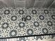 Beautiful shower with patterned tile flooring and gray tiled walls at 2953 Meadowview Se Dr, Atlanta, GA 30316