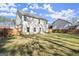 Great backyard with ample green space, wooden fence, and clear sky at 1511 Arica Ave, Lawrenceville, GA 30043