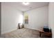 Empty bedroom with neutral carpet, a window and natural light at 1511 Arica Ave, Lawrenceville, GA 30043