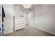 Bedroom with carpet and white walls and a dresser at 1511 Arica Ave, Lawrenceville, GA 30043