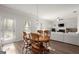 Dining area with table and chairs. View of a well lit living area at 1511 Arica Ave, Lawrenceville, GA 30043